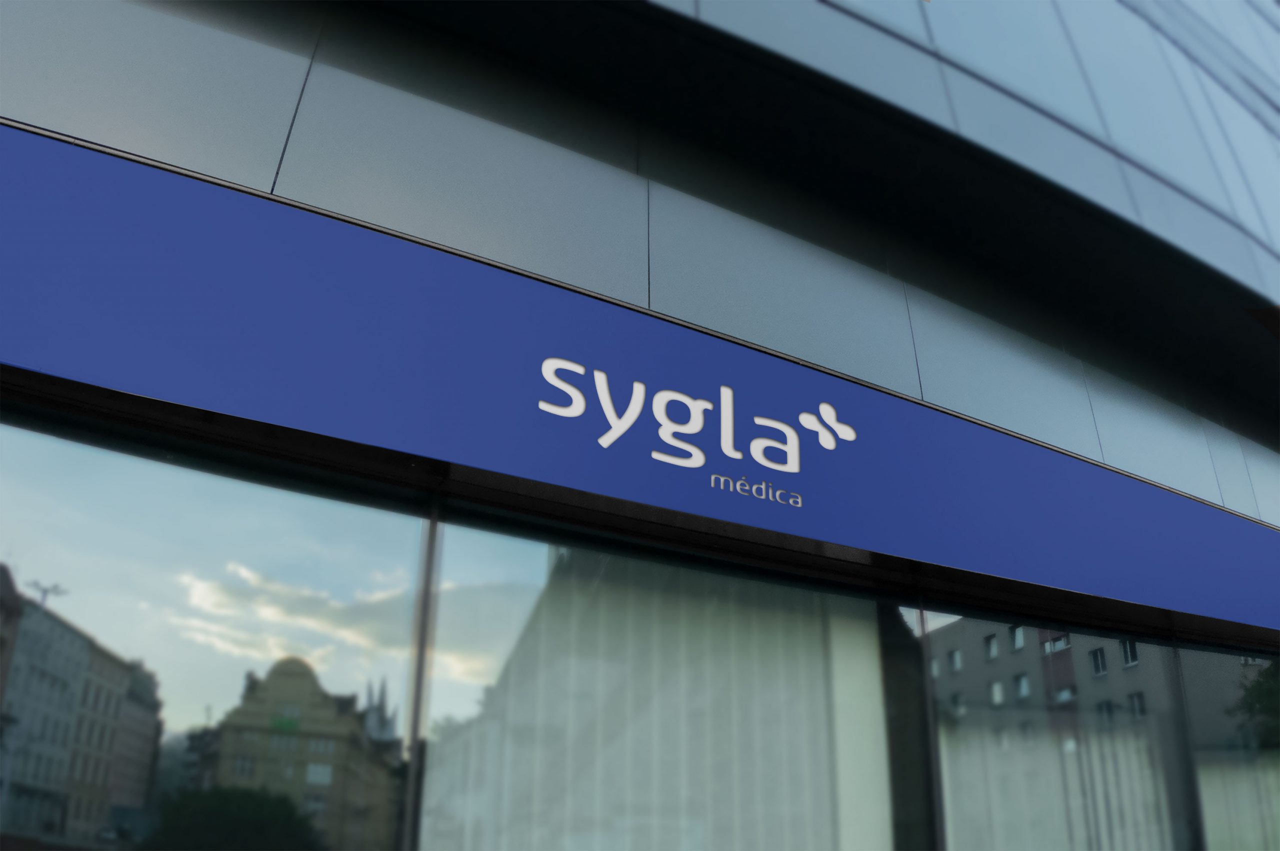 sygla-press7-logo-fachada